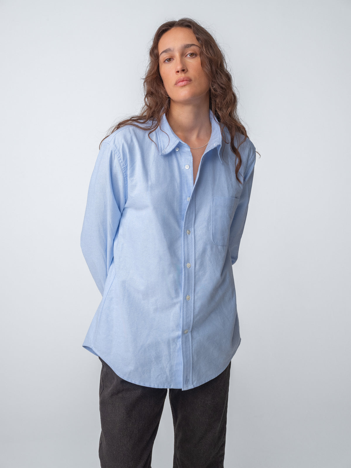 Woman wearing Hanover Essential Oxford Shirt in Blue on model
