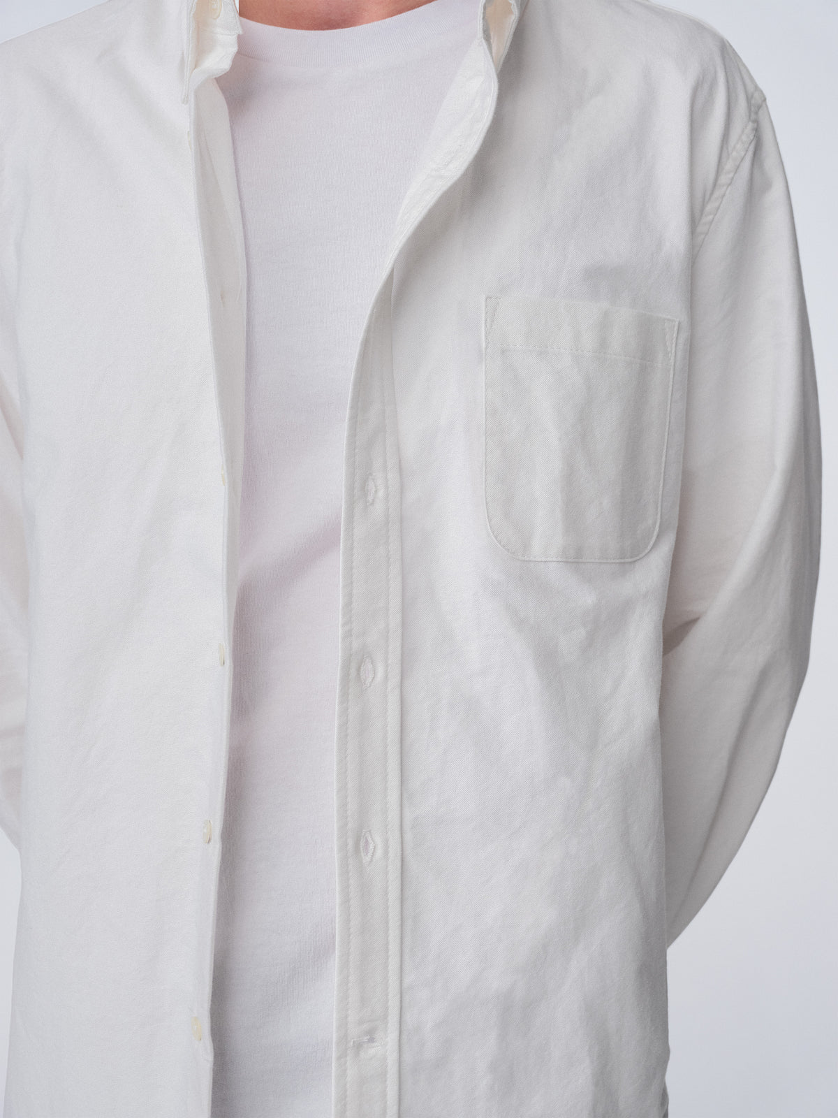 Close up of guy wearing Hanover Essential Oxford Shirt in White on model