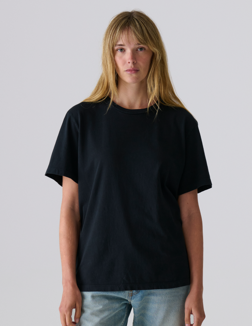 Model female wearing Staple T-Shirt in white torso view