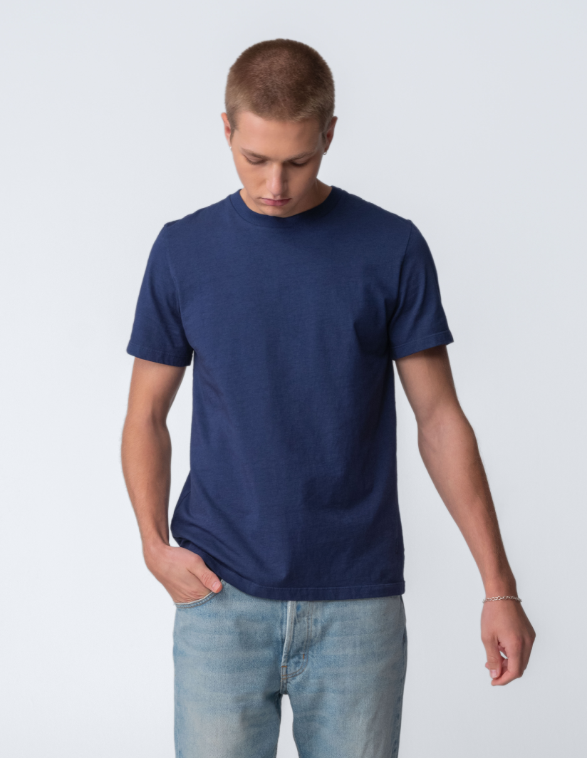 Model guy wearing Staple T-Shirt in true navy torso view