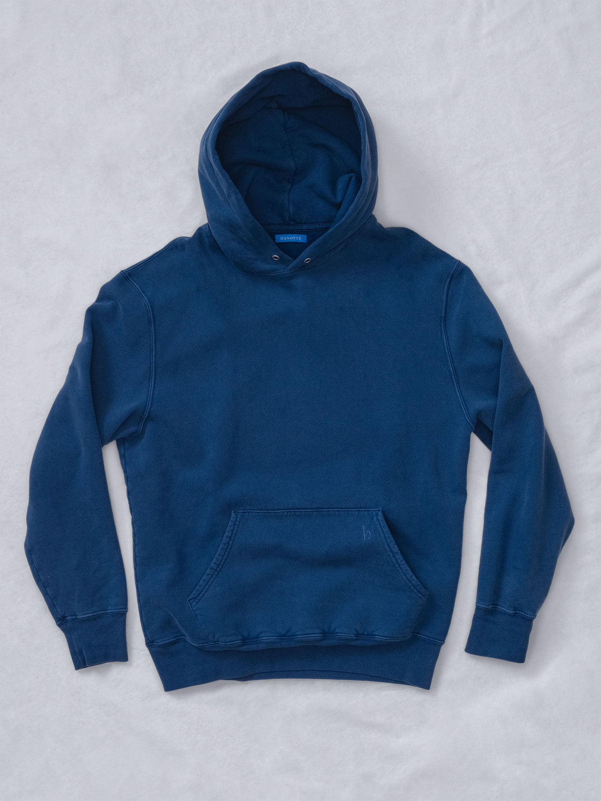 Flat lay Sunwashed Staple Hoodie in mid navy
