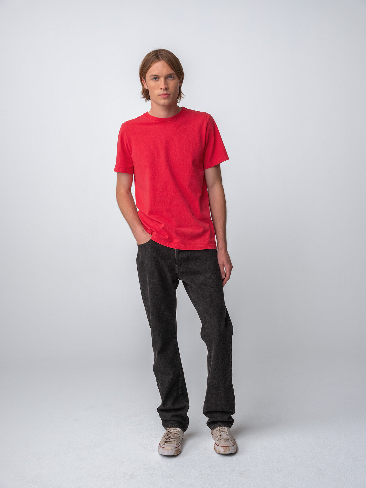 Model wearing Sunwashed Staple T-Shirt in cherry full body view