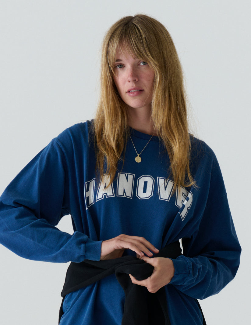 Model female wearing a mid navy Hanover Long Sleeve Tee 